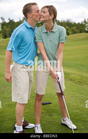 Couple Playing Golf, Burlington, Ontario, Canada Banque D'Images