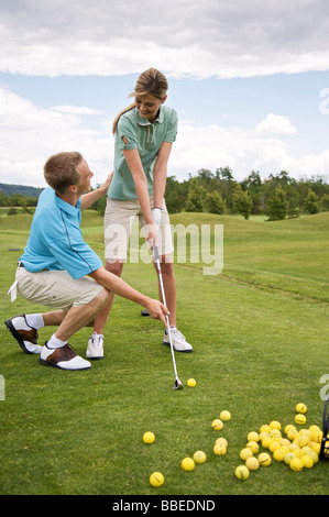 Couple Playing Golf, Burlington, Ontario, Canada Banque D'Images