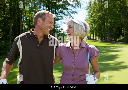 Portrait of Couple Golfing Banque D'Images