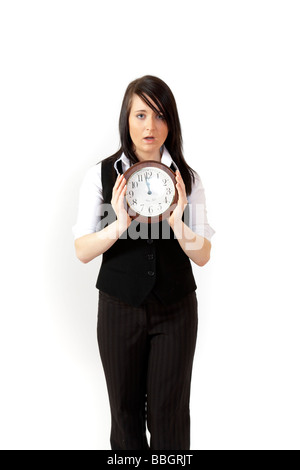 Young brunette business woman avec colck. Banque D'Images