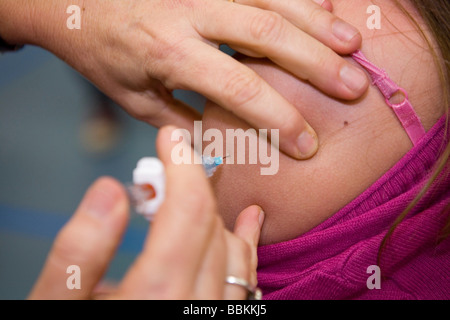 Campagne nationale de vaccination contre le cancer du col de l'agrégat n'a pas révélé de nombreuses mères affectives sont réticents à Banque D'Images