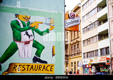 Restaurant sign en tchèque sur le côté d'un immeuble dans le centre de Prague Banque D'Images