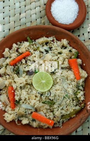 Upma est essentiellement un élément petit-déjeuner indien du sud et est habituellement fait avec les grains de blé raffiné Banque D'Images