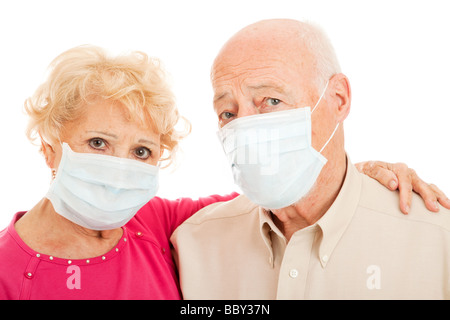Couple de masques pour se protéger contre l'épidémie de grippe porcine Banque D'Images
