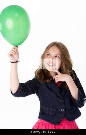 Young Girl Holding a Balloon Banque D'Images