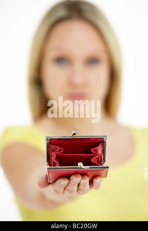 Woman Holding Empty Purse Banque D'Images