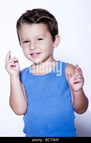 Expresiive et charmant studio portrait enfant fond isolé Banque D'Images