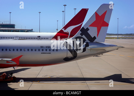 QANTAS et Jet Star planes à la borne Banque D'Images