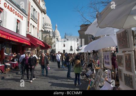 Un marché de l'Art de la rue Paris Montmartre Sacré Coeur avec en arrière-plan Paris France Europe Banque D'Images