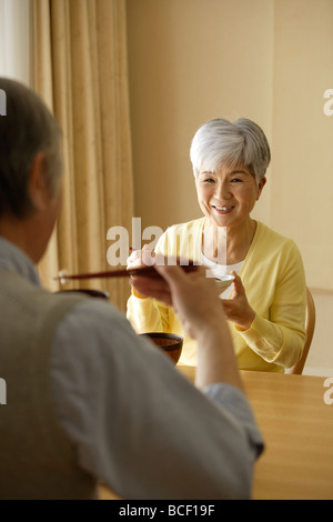 Senior couple having meal Banque D'Images