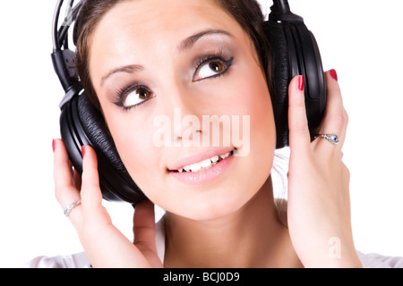 Jeune femme avec gros headphones isolated on white Banque D'Images