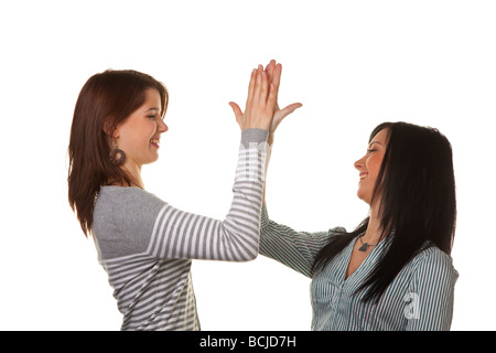 Deux jeunes filles et poignée de main d'accord Banque D'Images