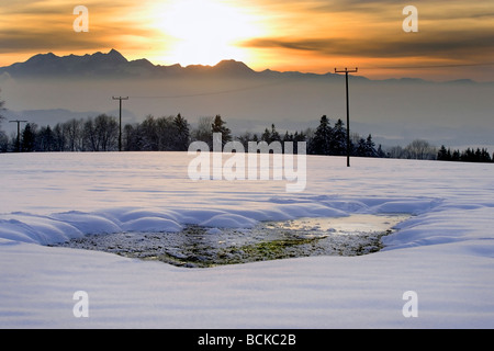 Coucher du soleil, le paysage d'hiver avec vue de Ratzinger Höhe à l'Allemagne Bavière Wendelstein Banque D'Images