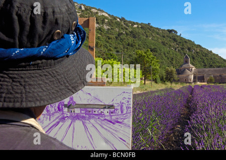 La peinture de l'artiste dans les champs de lavande à l'Abbaye Notre Dame de l'Abbaye de Senanque Senaque Gordes Provence France Banque D'Images