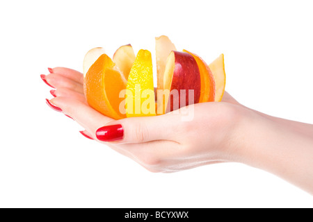 Main Femme avec mélange de fruits isolated on white Banque D'Images