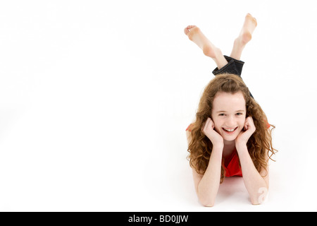 Jeune fille portant sur l'estomac Banque D'Images