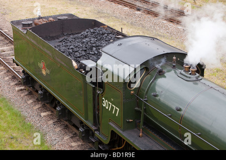 Un train à vapeur fonctionnant sur le Quorn Loughborough Leicestershire Royaume-Uni près de fer Banque D'Images