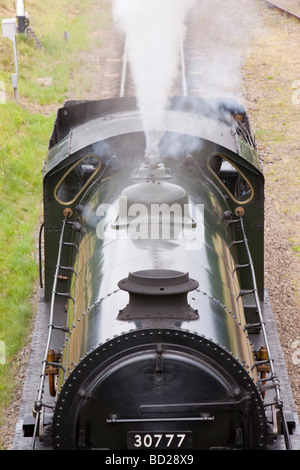 Un train à vapeur fonctionnant sur le Quorn Loughborough Leicestershire Royaume-Uni près de fer Banque D'Images