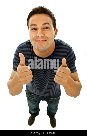 Jeune homme passe Thumbs up in a white background Banque D'Images