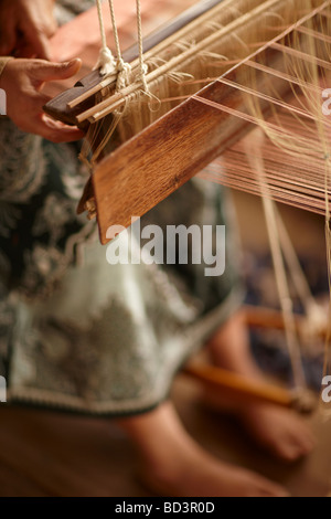 Le tissage de la soie à Luang Prabang, Laos Banque D'Images