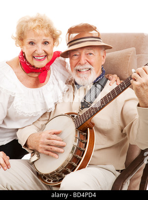 Portrait of senior couple qui joue du banjo et chanter country music Banque D'Images