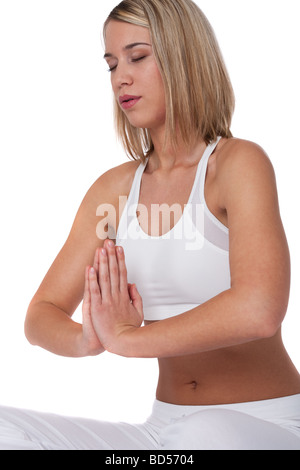 Blonde woman in yoga position sur fond blanc Banque D'Images