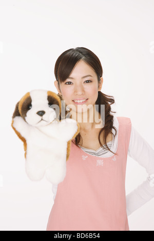 Artiste de la scène montrant soft toy Banque D'Images