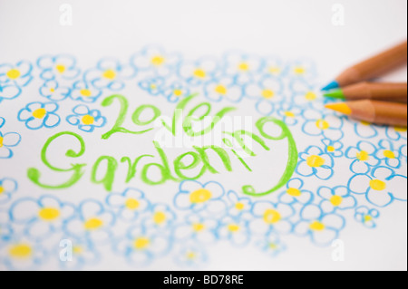 L'amour et de jardinage fleurs, dessin d'enfant et crayons de couleur Banque D'Images