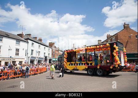 En nous comme un camion Carnival Carnival Market Harborough flotteur en Angleterre Banque D'Images