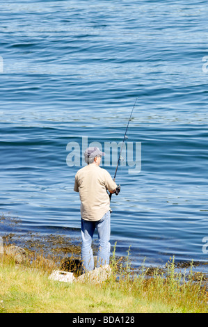 Pêche à l'Homme seul de Cape Cod Canal. Cape Cod, Massachusetts USA Banque D'Images