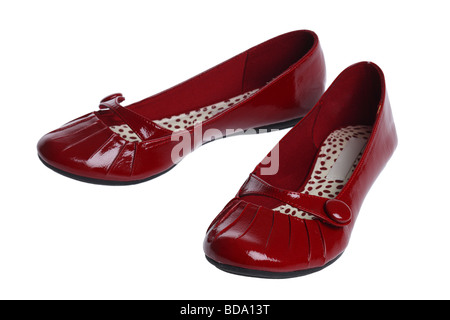 Chaussures rouges sur fond blanc Banque D'Images