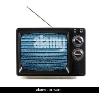 La télévision vintage avec bandes de neige et les schémas d'isoler sur fond blanc Banque D'Images