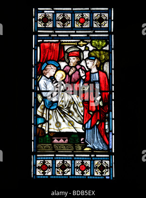 Vitraux de Bell & Almond représentant Luc 1 57 naissance de l'église Saint-Jean-Baptiste Earls Barton Northamptonshire Banque D'Images