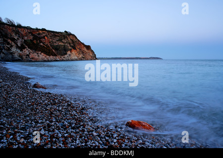 Saint Austell plage au crépuscule, à Cornwall, en Angleterre. Banque D'Images