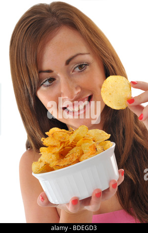 Chips, Woman eating crisps Banque D'Images