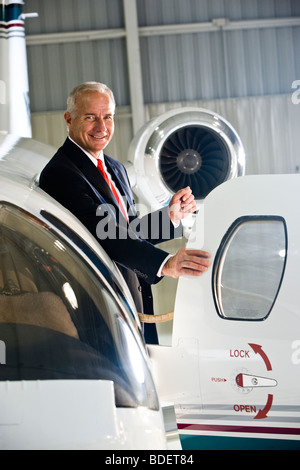 Woman porte de corporate jet Banque D'Images