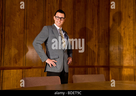 Vintage portrait of Mid adult businessman in boardroom Banque D'Images