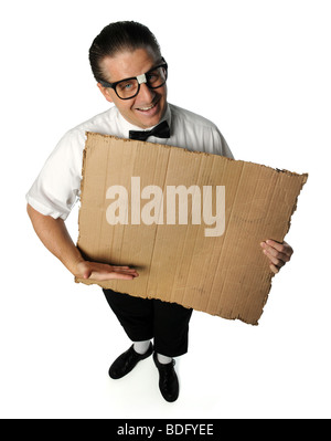 Portrait d'un homme habillé en nerd holding blank carton isolated over white Banque D'Images