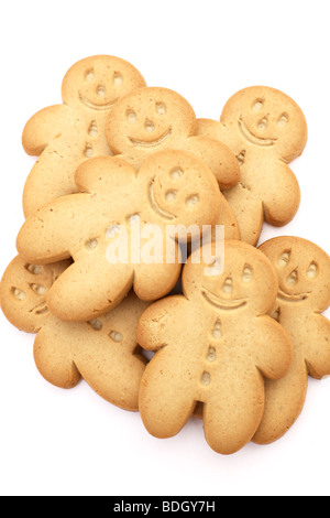 Une pile de gingerbread men against a white background Banque D'Images