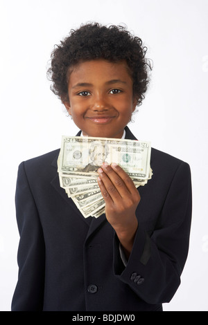 Boy Holding Money Banque D'Images