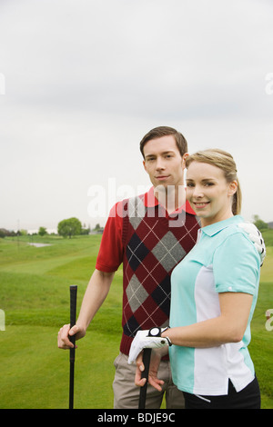 Couple de golf Banque D'Images