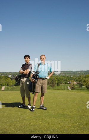 Les hommes on Golf Course Banque D'Images