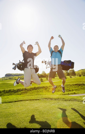 Les hommes au terrain de Golf Banque D'Images