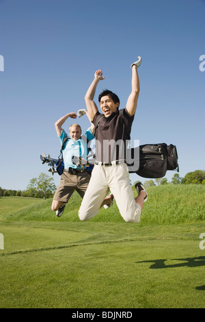 Les hommes au terrain de Golf Banque D'Images