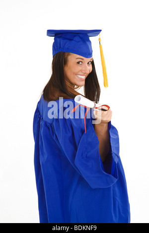 Une belle Caucasian teenager dans une graduation gown on a white background Banque D'Images