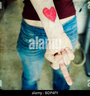 Close-up of a woman's hand avec un coeur sur son poignet Banque D'Images