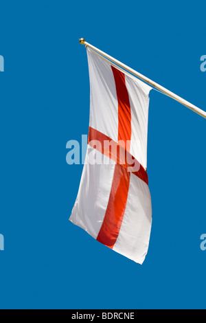 St George's flag against blue sky Banque D'Images