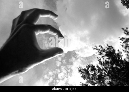 Toucher un nuage Banque D'Images