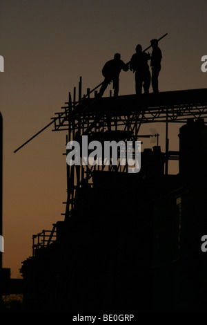 Les travaux de reconstruction des maisons endommagées par une tornade à Londres. Banque D'Images