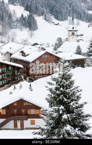 Grindelwald, l'église du village après une lourde chute de neige, Jungfrau Region, Oberland Bernois, Alpes Suisses, Suisse Banque D'Images